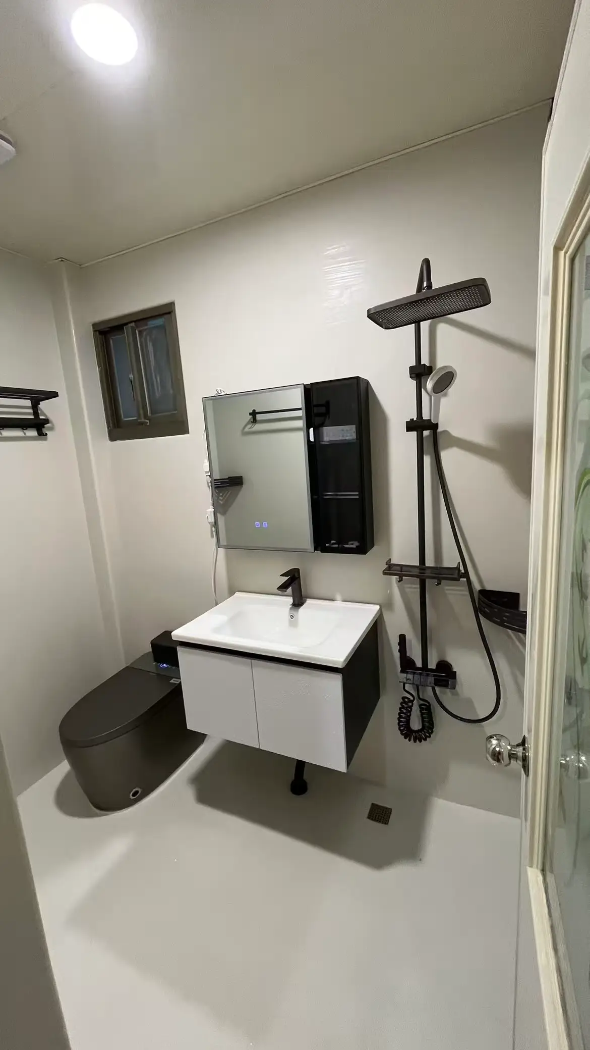Completed residential wet-area surface renovation.